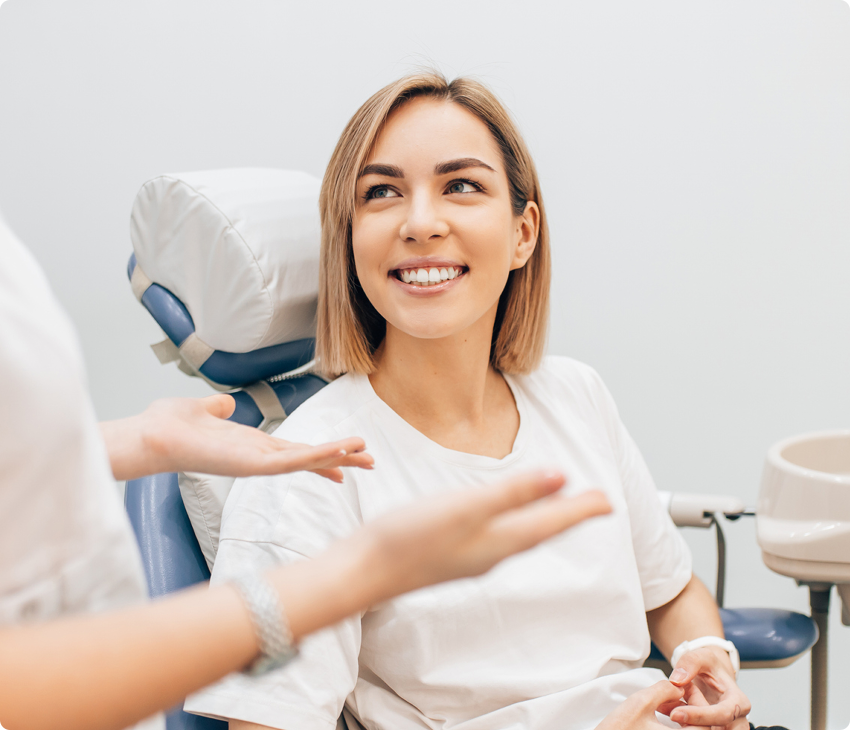 oral surgeon patient in a chair in an oral surgeons office