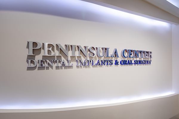 Peninsula Center for Dental Implants office sign