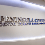 Peninsula Center for Dental Implants office sign